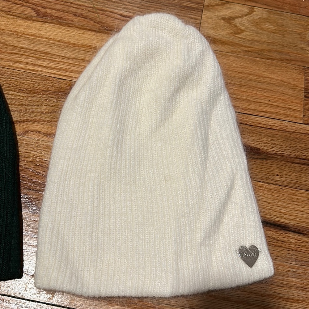 Cream beanie with black stitching detail